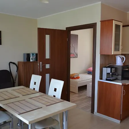 W Lesie Nad Jeziorem Apartament *